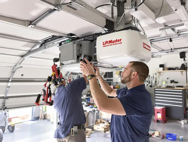 Hudson Garage Door Repair technician performing advanced diagnostics on garage opener in Hudson