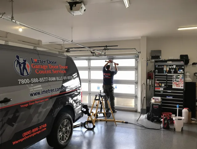 Hudson Garage Door Repair team performing same-day garage door repair in Hudson