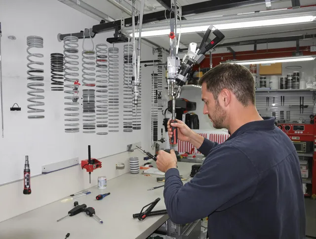 Hudson Garage Door Repair safety certified technician performing precision spring replacement in Hudson