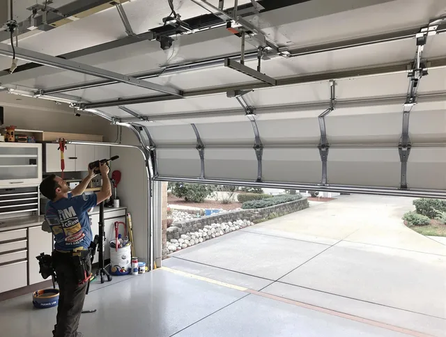 Garage door track repair service by Hudson Garage Door Repair in Hudson